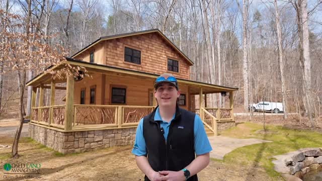 DSLD custom cabin construction project in a wooded setting